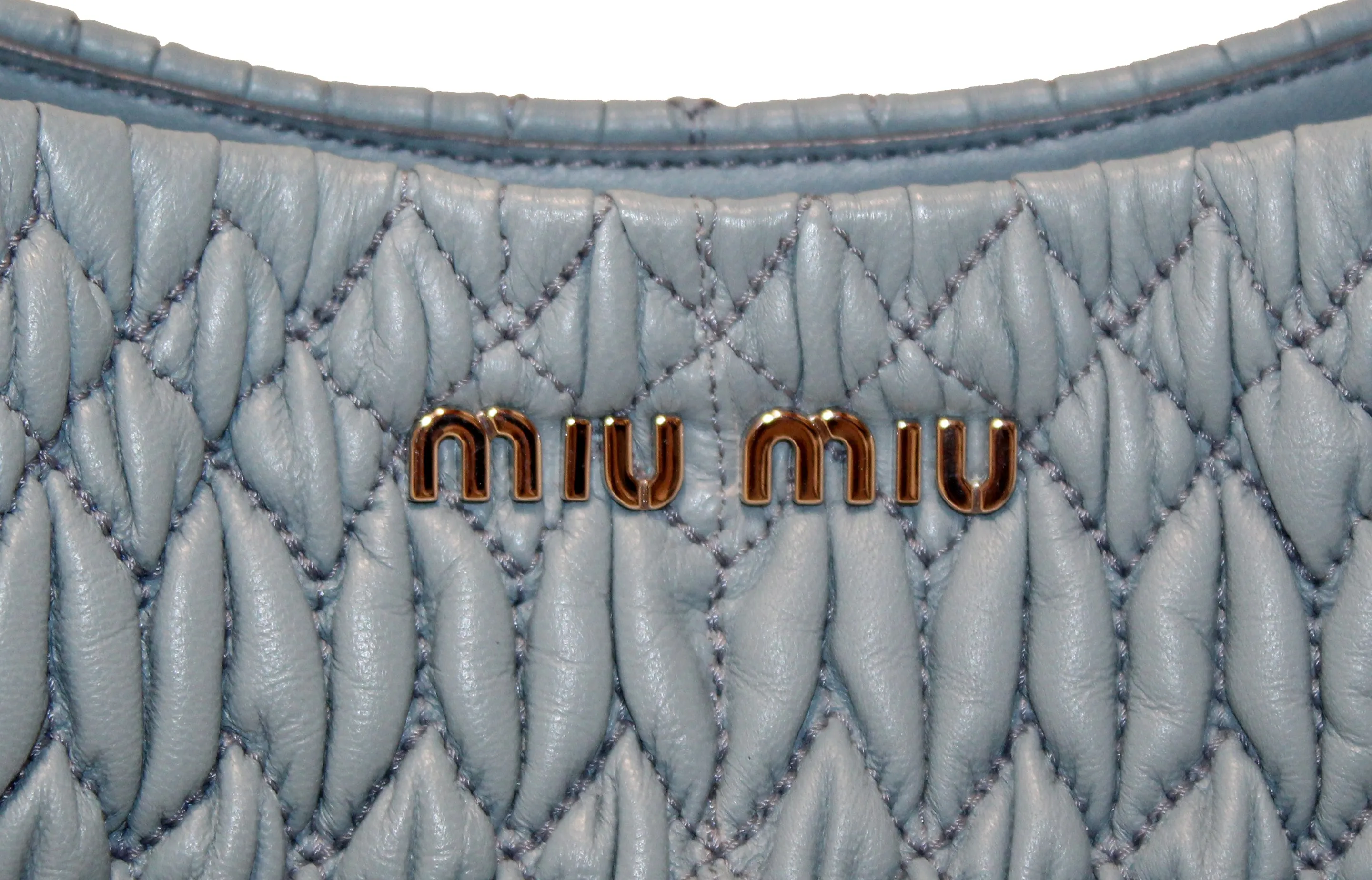 Authentic Miu Miu Crystal Blue Cloqué Nappa Leather Handbag