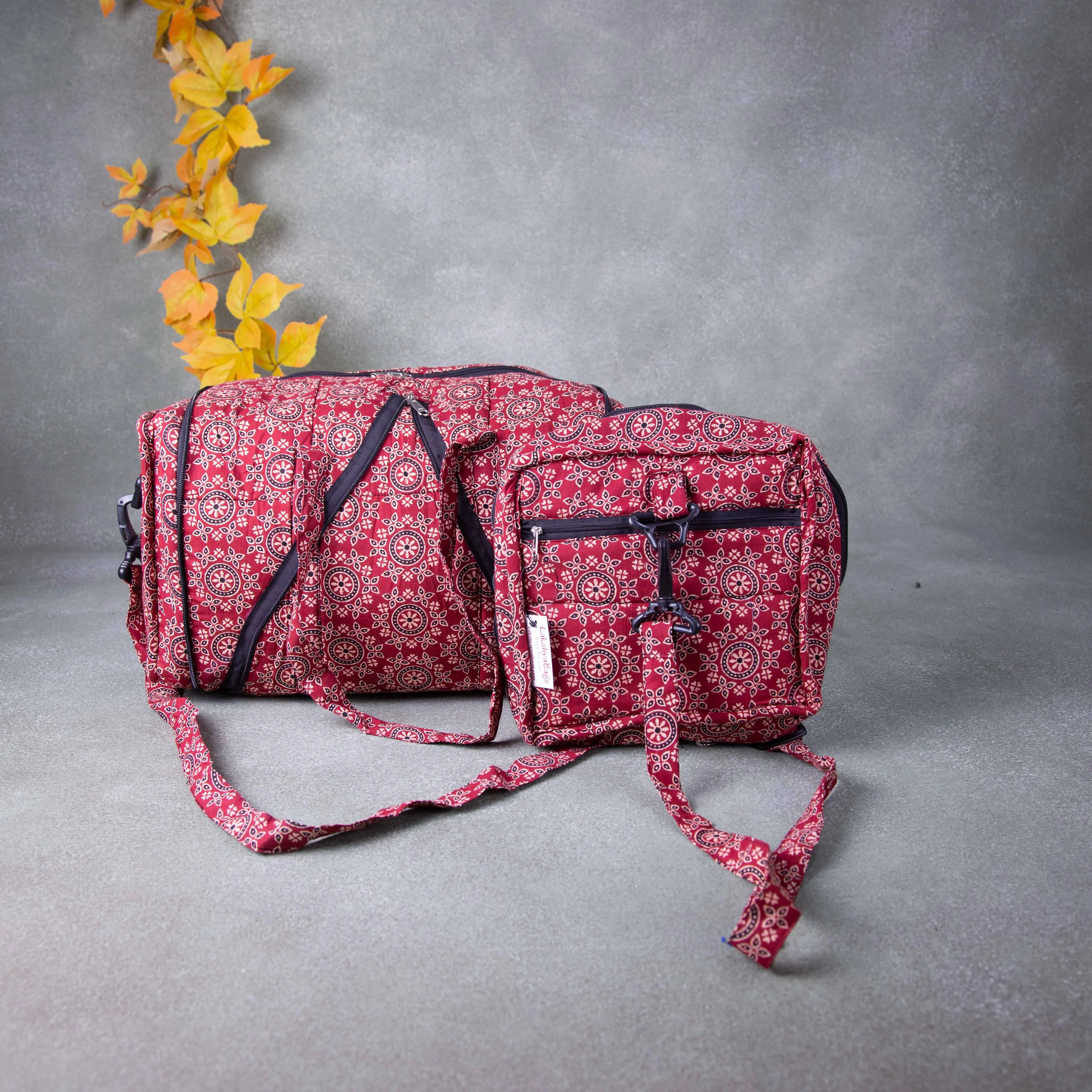 Expandable Travel Bag Maroon Colour with Black and Sandal Circle Design.